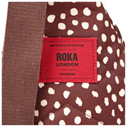 Roka Willesden grote crossbodytas van gerecycled canvas - Bruine vlek