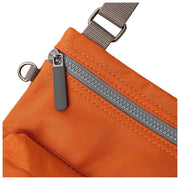 roka-chelsea-b-medium-recycled-nylon-sling-bag---burnt-orange-35907458