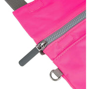 Roka Stratford Recycled Nylon Sling Bag - Neon Pink